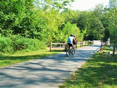 Two bicyclists on the Northwest River Trail.